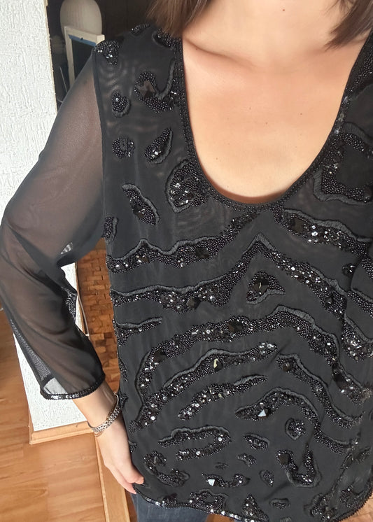 TOP VINTAGE DE CUENTAS NEGRAS