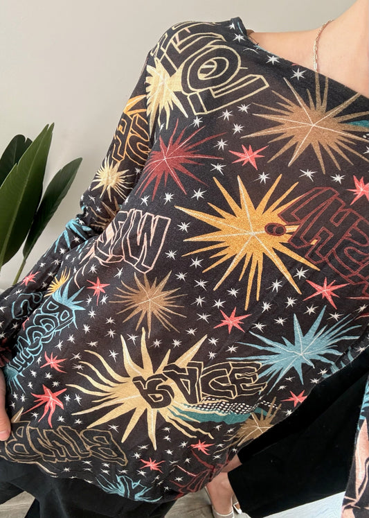 BLUSA SHEER CON PRINT MANGA LARGA