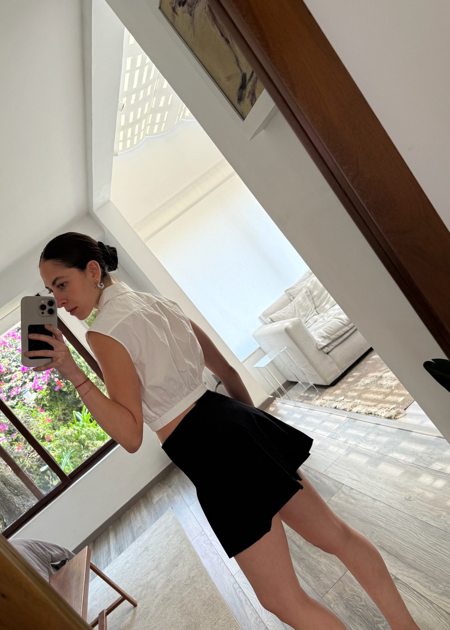 FALDA PLIZADA NEGRA MINI