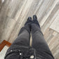 JEANS LOW RISE CON ESTOPEROLES