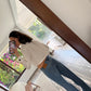 CAMISA CROPPED CON BOTONES NEGROS