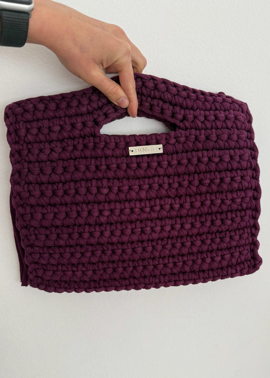 CLUTCH VINO CON FLECOS