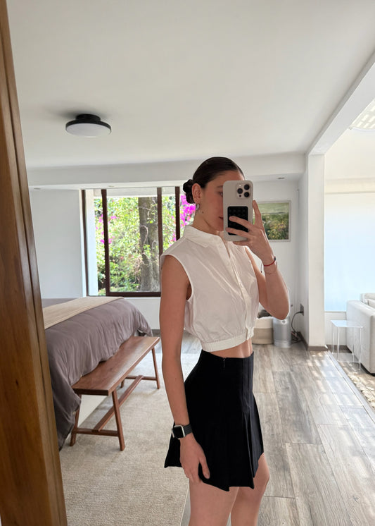 FALDA PLIZADA NEGRA MINI