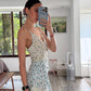 VESTIDO CON PRINT FLOREADO ASIMÉTRICO