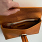 CLUTCH NARANJA