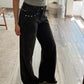 JEANS LOW RISE CON ESTOPEROLES