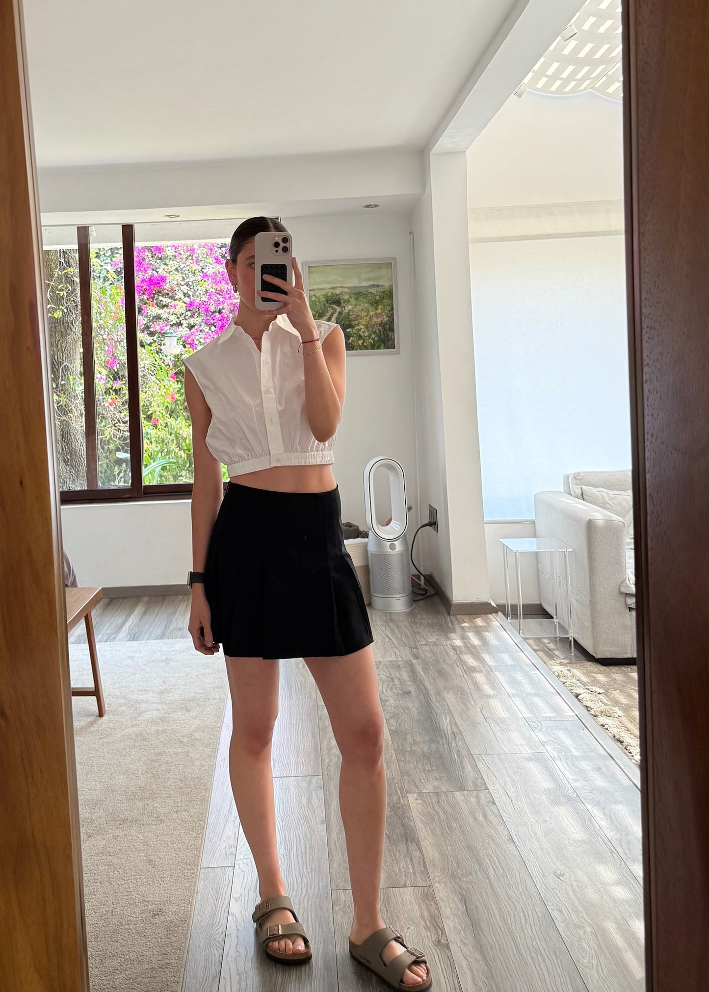 FALDA PLIZADA NEGRA MINI