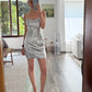 VESTIDO MINI DE LENTEJUELAS PLATEADAS