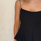 TOP CORTE PEPLUM NEGRO