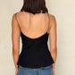 TOP CORTE PEPLUM NEGRO