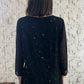 TOP VINTAGE DE CUENTAS NEGRAS