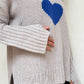 SUÉTER CUELLO ALTO CORAZÓN