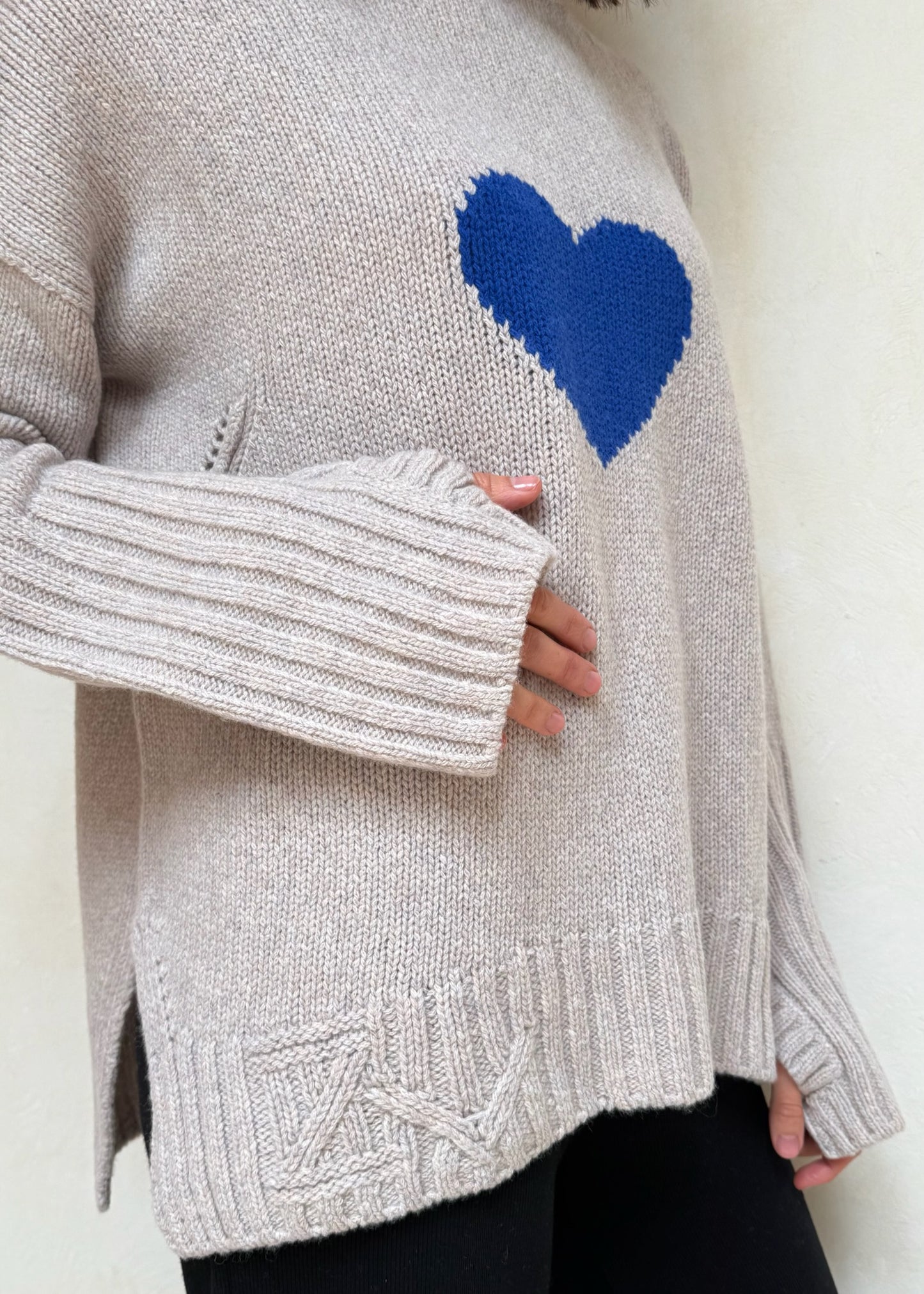 SUÉTER CUELLO ALTO CORAZÓN