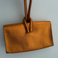 CLUTCH NARANJA