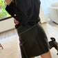 FALDA DE FAUX LEATHER CON CINTURÓN
