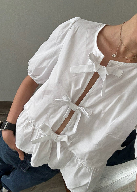 CAMISA BLANCA CON MOÑOS