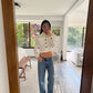 CAMISA CROPPED CON BOTONES NEGROS