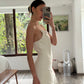 VESTIDO STRAPLESS CON FLECOS