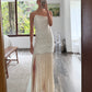 VESTIDO STRAPLESS CON FLECOS